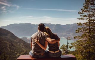 Happy couple on a mountaintop